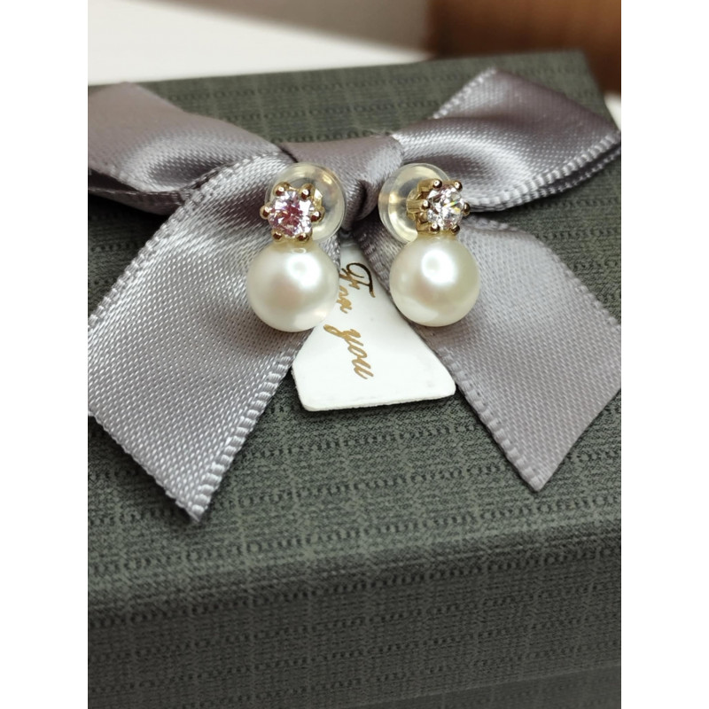 Σκουλαρίκια μαργαριτάρι...